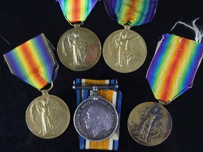 Lot 119 - A collection of four WW I Victory medals,...