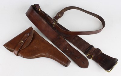 Lot 310 - A WW I leather Sam Browne belt with brass...