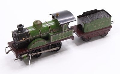 Lot 305 - Bing 0-4-0 clockwork loco & tender GNR green...