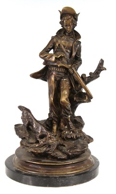 Lot 411 - A bronzed figure of a huntsman, modelled in...