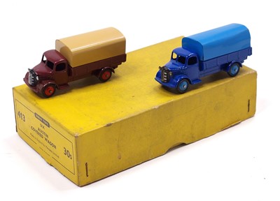 Lot 1279 - A Dinky Toys trade box No. 413 Austin covered...