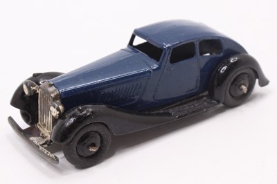 Lot 1121 - A Dinky Toys No. 36D Rover, comprising dark...