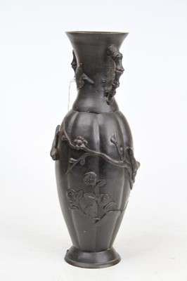 Lot 34 - A Japanese Meiji period  bronze vase, relief...
