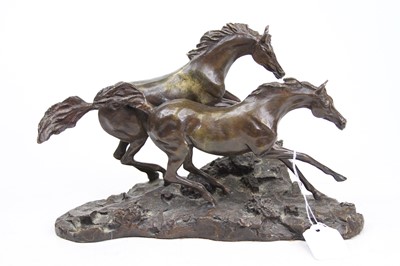Lot 42 - A bronze model of galloping horses, width 28cm