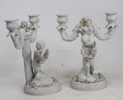 Lot 43 - A pair of Victorian Parian twin branch table...