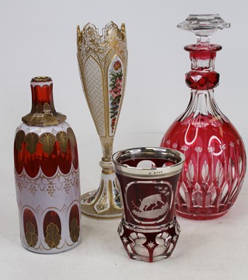 Lot 60 - A ruby overlaid glass tumbler etched with stag...