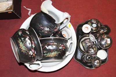 Lot 104 - A black glazed wash set