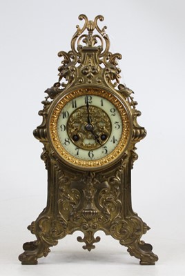 Lot 207 - A 19th century French brass mantel clock, the...