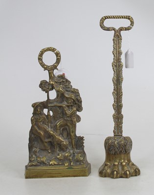 Lot 208 - A 19th century brass doorstop in the form of a...