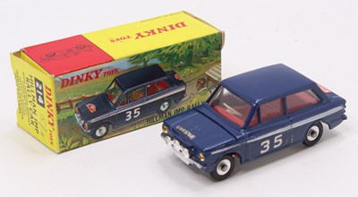 Lot 1113 - A Dinky Toys No. 214 Hillman Imp rally car,...