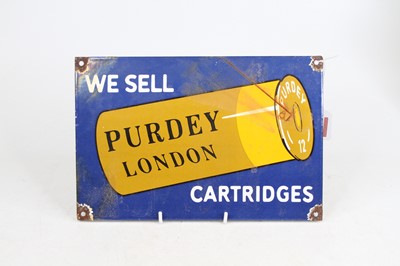 Lot 214 - An enamel on metal Purdey Shotgun cartridges...