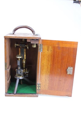 Lot 113 - A 19th century brass monocular microscope, the...