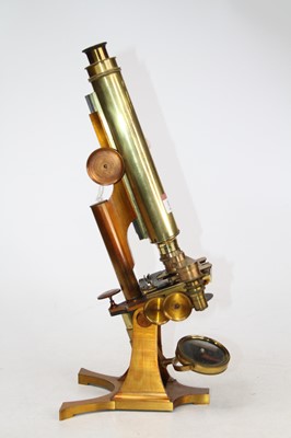 Lot 119 - A 19th century brass monocular microscope, the...