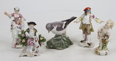 Lot 246 - A collection of three porcelain figures, each...