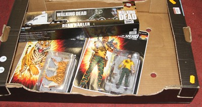 Lot 1534 - One box of Walking Dead action figures and...