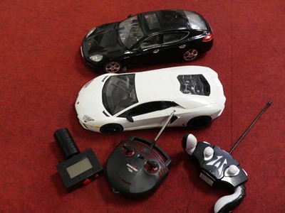 Lot 1563 - A pair of DX Toys radio controlled cars to...