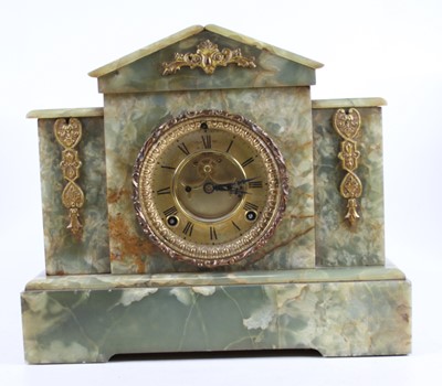 Lot 180 - A circa 1900 onyx mantel clock of...