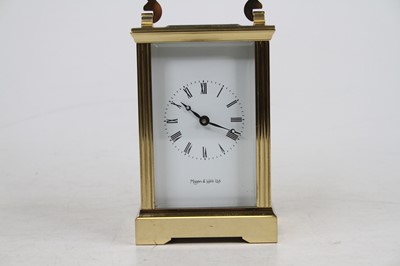 Lot 188 - A Mappin & Webb lacquered brass carriage clock,...