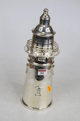 Lot 302 - A modern silver plated lighthouse cocktail...