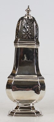 Lot 334 - An Art Deco silver pedestal lighthouse sugar...