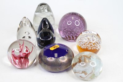 Lot 273 - A collection of coloured glass paperweights