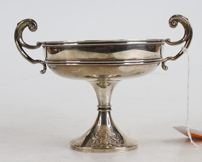 Lot 346 - An Edwardian silver pedestal twin handled...