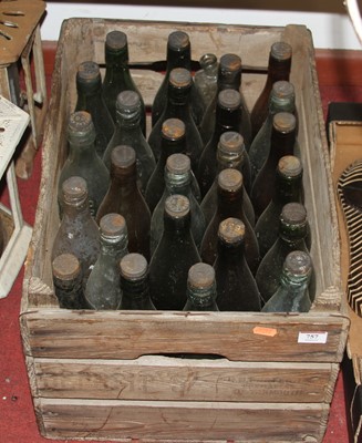 Lot 757 - A vintage wooden crate containing glass...