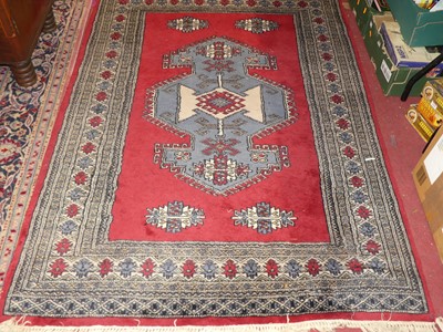 Lot 1175 - A Persian woollen blue ground Bokhara rug, 185...