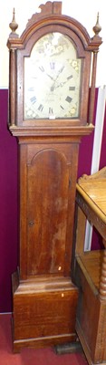 Lot 1200 - An early 19th century provincial oak long case...