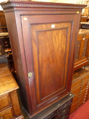 Lot 1213 - An early 19th century mahogany single door...