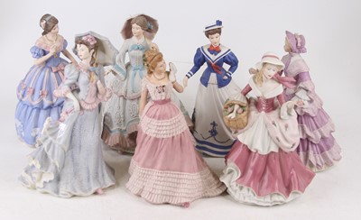 Lot 645 - A collection of seven bisque porcelain figures...