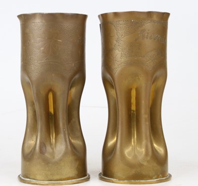 Lot 576 - A pair of WWI brass shell case trench art...