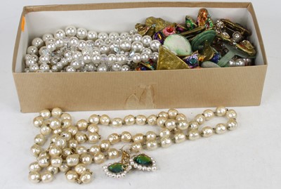 Lot 583 - A collection of costume jewellery, to include...