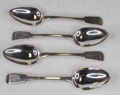 Lot 354 - A set of four George III silver tablespoons in...