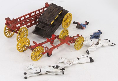 Lot 656 - A painted cast iron model of a stagecoach