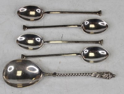 Lot 389 - A set of four silver coffee spoons; together...