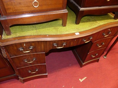 Lot 1230 - A contemporary mahogany serpentine kneehole...