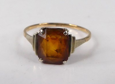 Lot 404 - A 9ct gold and citrine set dress ring, 1.8g,...