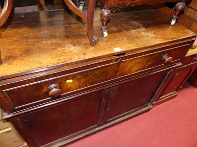 Lot 1245 - A Victorian Regency mahogany secretaire...