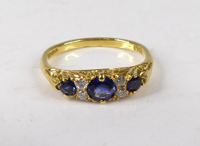 Lot 408 - An Edwardian style 18ct gold sapphire and...