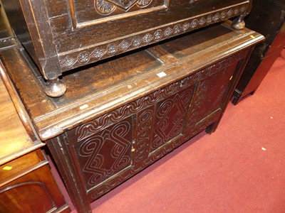 Lot 1252 - An antique joined oak and later line carved...