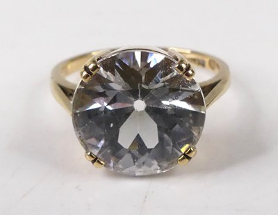 Lot 419 - A 9ct gold and white sapphire set dress ring,...