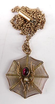 Lot 422 - A 9ct gold pendant fashioned as a spider web,...