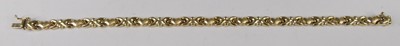 Lot 425 - A continental yellow metal fancylink bracelet,...