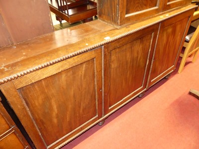 Lot 1274 - A Regency mahogany three door side cupboard,...