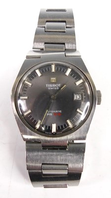 Lot 438 - A gent's Tissot PR516 steel cased automatic...