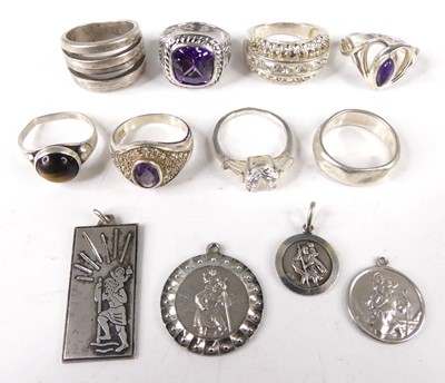 Lot 441 - A collection of modern silver dress rings, to...