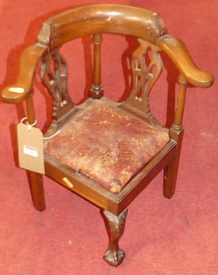 Lot 1290 - A child's mahogany tub back corner chair in...