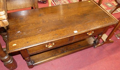 Lot 1301 - A contemporary joined oak low two tier two...