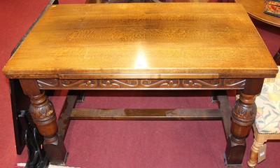 Lot 1308 - A contemporary joined oak draw-leaf refectory...